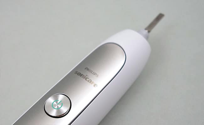 Philips Sonicare Flexcare Platinum electric toothbrush close up on power button