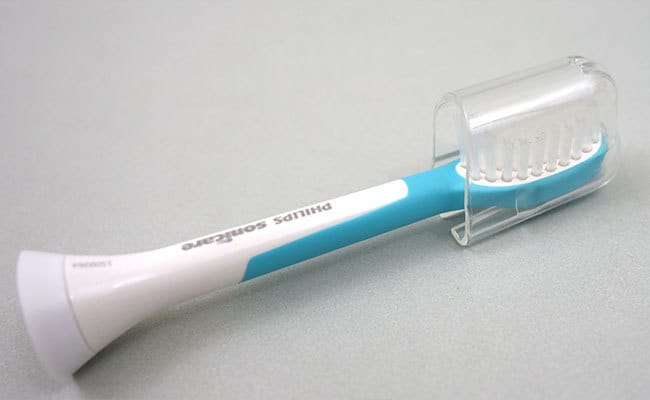 Philips Sonicare For Kids Electric Toothbrush brush head protected by plastic cover