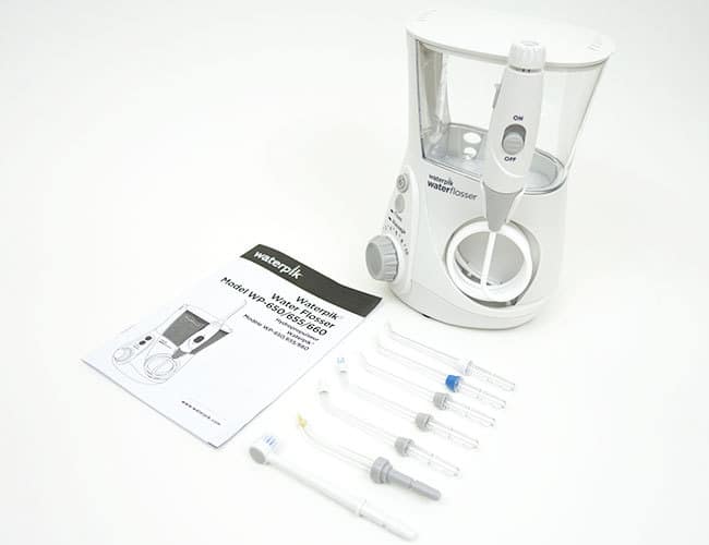 Waterpik Aquarius Professional water flosser, tips and instruction manual that come in the box